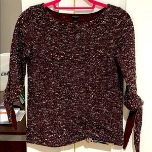 3 quarter sleeve top. Fits well on body.